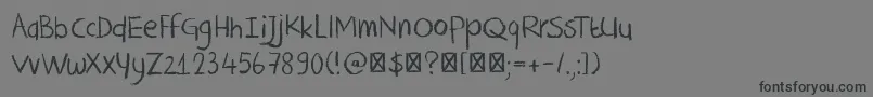 DkCrayonCrumble-Schriftart – Schwarze Schriften auf grauem Hintergrund