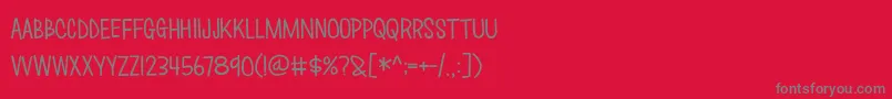 フォントLove Monster – 赤い背景に灰色の文字