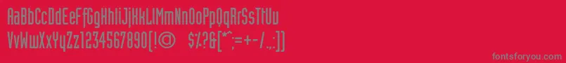 フォントIndustrytmc – 赤い背景に灰色の文字