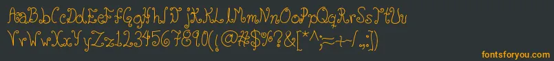 フォントGlyphy – 黒い背景にオレンジの文字