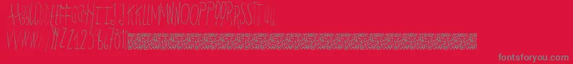フォントYardentawns – 赤い背景に灰色の文字