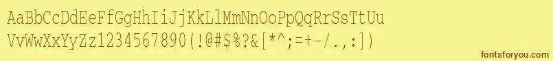 フォントCourierctt65 – 茶色の文字が黄色の背景にあります。