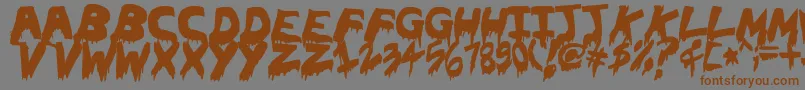フォントOhthehorror – 茶色の文字が灰色の背景にあります。