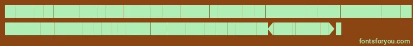 フォントKglaughterlinesbase – 緑色の文字が茶色の背景にあります。