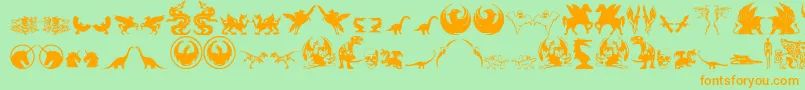 FantasticCreatures-Schriftart – Orangefarbene Schriften auf grünem Hintergrund