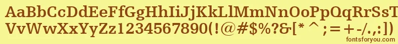 フォントHumanistSlabserif712BoldBt – 茶色の文字が黄色の背景にあります。