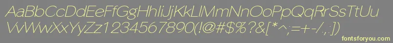 PhinsterfineItalic Font – Yellow Fonts on Gray Background