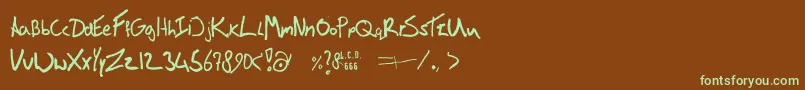 フォントVictorsFont – 緑色の文字が茶色の背景にあります。