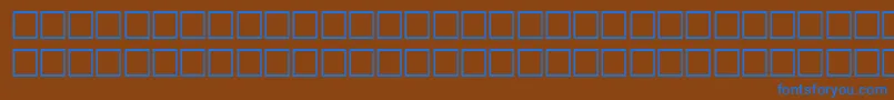 SilmanuscriptipaRegular-fontti – siniset fontit ruskealla taustalla