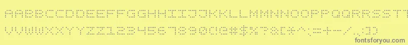 SquareDotDigital7 Font – Gray Fonts on Yellow Background