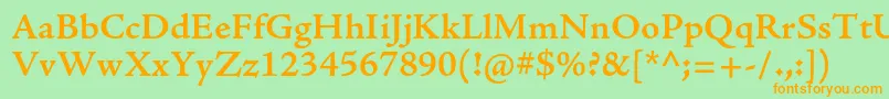 フォントAjensonproSemiboldcapt – オレンジの文字が緑の背景にあります。