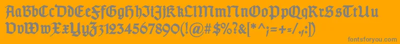 GotischdBold-Schriftart – Graue Schriften auf orangefarbenem Hintergrund