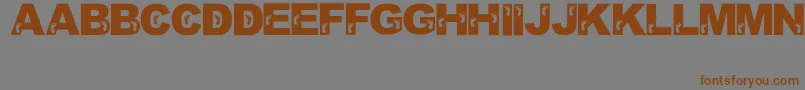 JennasFeet Font – Brown Fonts on Gray Background