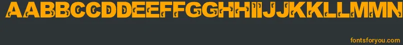 JennasFeet Font – Orange Fonts on Black Background