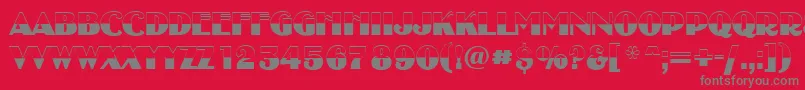 フォントAUncleytitulbwBold – 赤い背景に灰色の文字