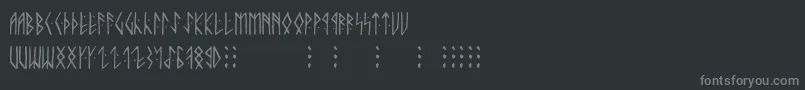 フォントRunicaltno – 黒い背景に灰色の文字