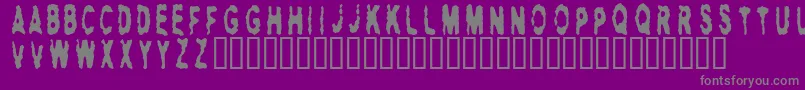 Hitman ffy-Schriftart – Graue Schriften auf violettem Hintergrund
