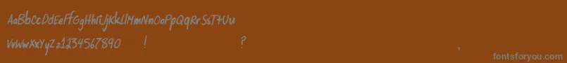 SupersonikLove Font – Gray Fonts on Brown Background