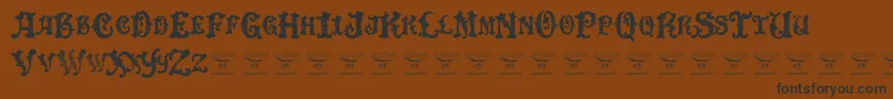 DinglehuckleberryRegular Font – Black Fonts on Brown Background