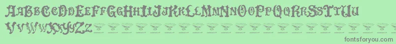 fuente DinglehuckleberryRegular – Fuentes Grises Sobre Fondo Verde