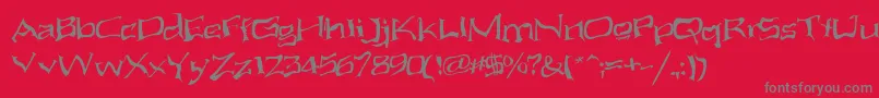 fuente AliensAteMyMum – Fuentes Grises Sobre Fondo Rojo