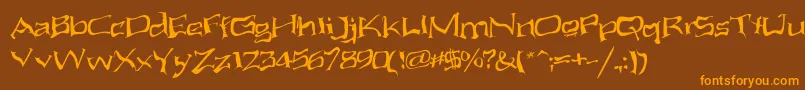 AliensAteMyMum Font – Orange Fonts on Brown Background