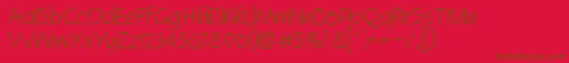 Шрифт SquawRegularDb – коричневые шрифты на красном фоне