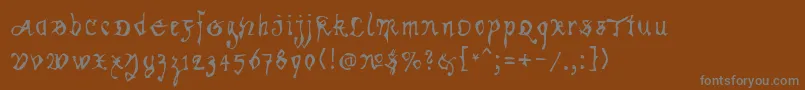 Weitere Informationen zur Kracklite-Schriftart Kracklite-Schriftart – Graue Schriften auf braunem Hintergrund