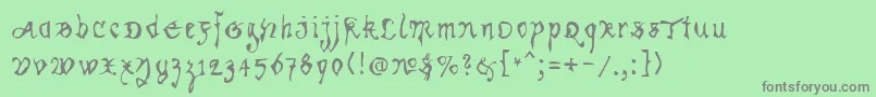 フォントKracklite – 緑の背景に灰色の文字