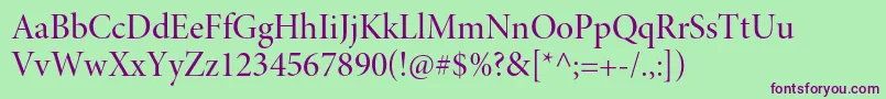 MinionproMediumdisp-fontti – violetit fontit vihreällä taustalla
