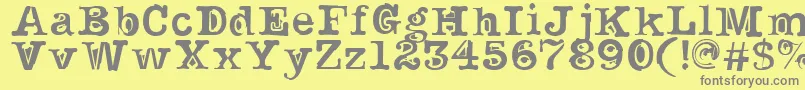 フォントNoirFilled – 黄色の背景に灰色の文字