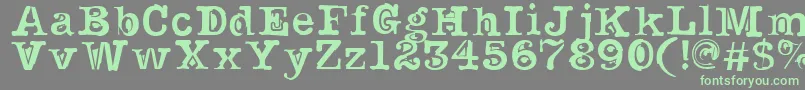 フォントNoirFilled – 灰色の背景に緑のフォント