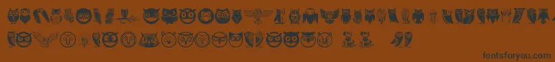 フォントOwl – 黒い文字が茶色の背景にあります