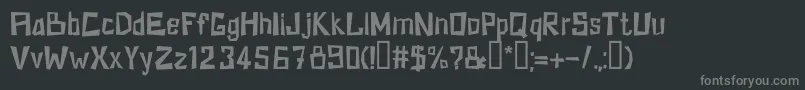 フォントKzkirpichRegular – 黒い背景に灰色の文字