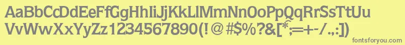 Q853FlareBold-fontti – harmaat kirjasimet keltaisella taustalla