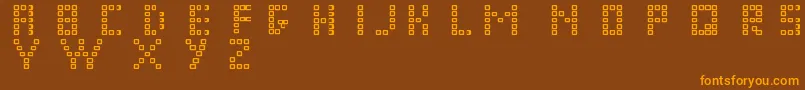 Czcionka Pixelchunker – pomarańczowe czcionki na brązowym tle