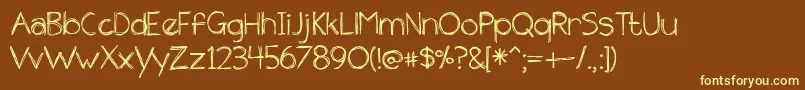 BmdTheUnseen-fontti – keltaiset fontit ruskealla taustalla