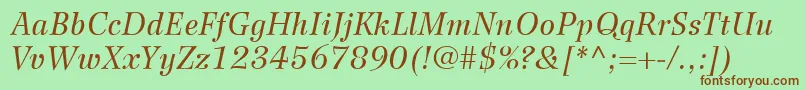 Fonte WilkeLt56Italic – fontes marrons em um fundo verde