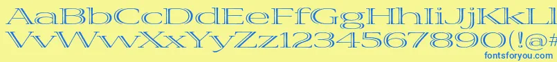 VivastdExtraextended Font – Blue Fonts on Yellow Background