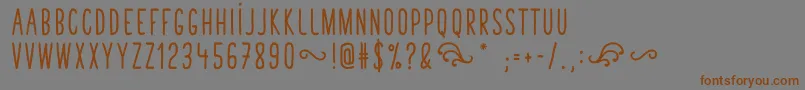 TastyBirdsBoldSans Font – Brown Fonts on Gray Background