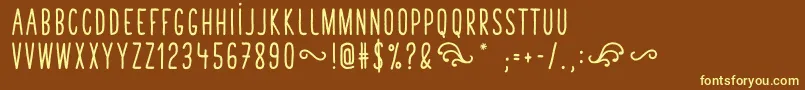 TastyBirdsBoldSans Font – Yellow Fonts on Brown Background