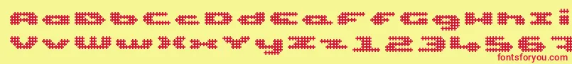 UpTinyLcdFourDecoc Font – Red Fonts on Yellow Background