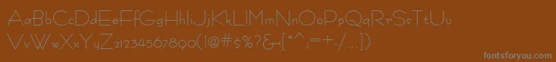 Fastrac Font – Gray Fonts on Brown Background
