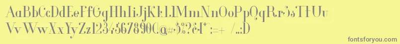 フォントGlamorCondensed – 黄色の背景に灰色の文字