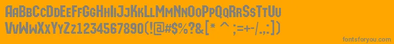 フォントAMachinaortocaps – オレンジの背景に灰色の文字