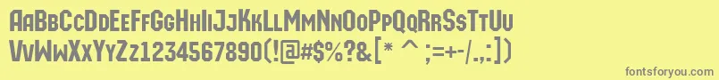 AMachinaortocaps Font – Gray Fonts on Yellow Background