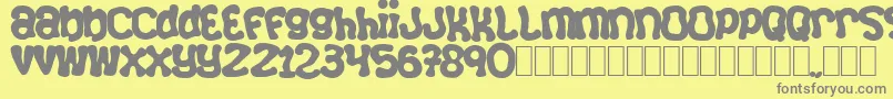 フォントSquizzlie – 黄色の背景に灰色の文字