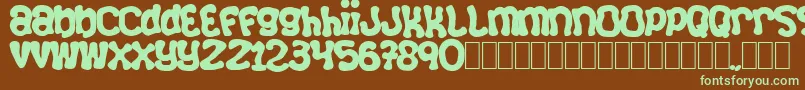 Squizzlie Font – Green Fonts on Brown Background