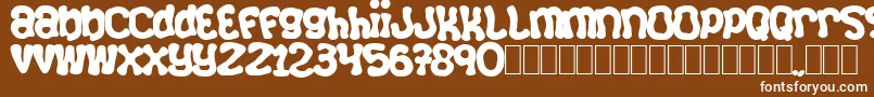 Squizzlie Font – White Fonts on Brown Background