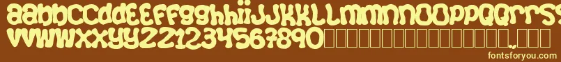 Squizzlie Font – Yellow Fonts on Brown Background